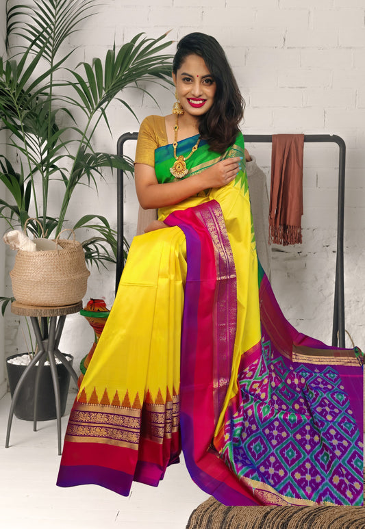 Golden Symphony: The Yellow Ganga Jamuna Ikat Kanchi Border Patola Silk Saree